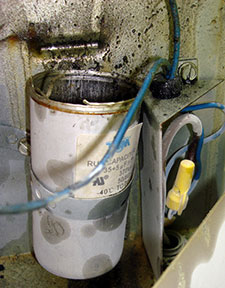This air conditioning capacitor shorted out and blew up.